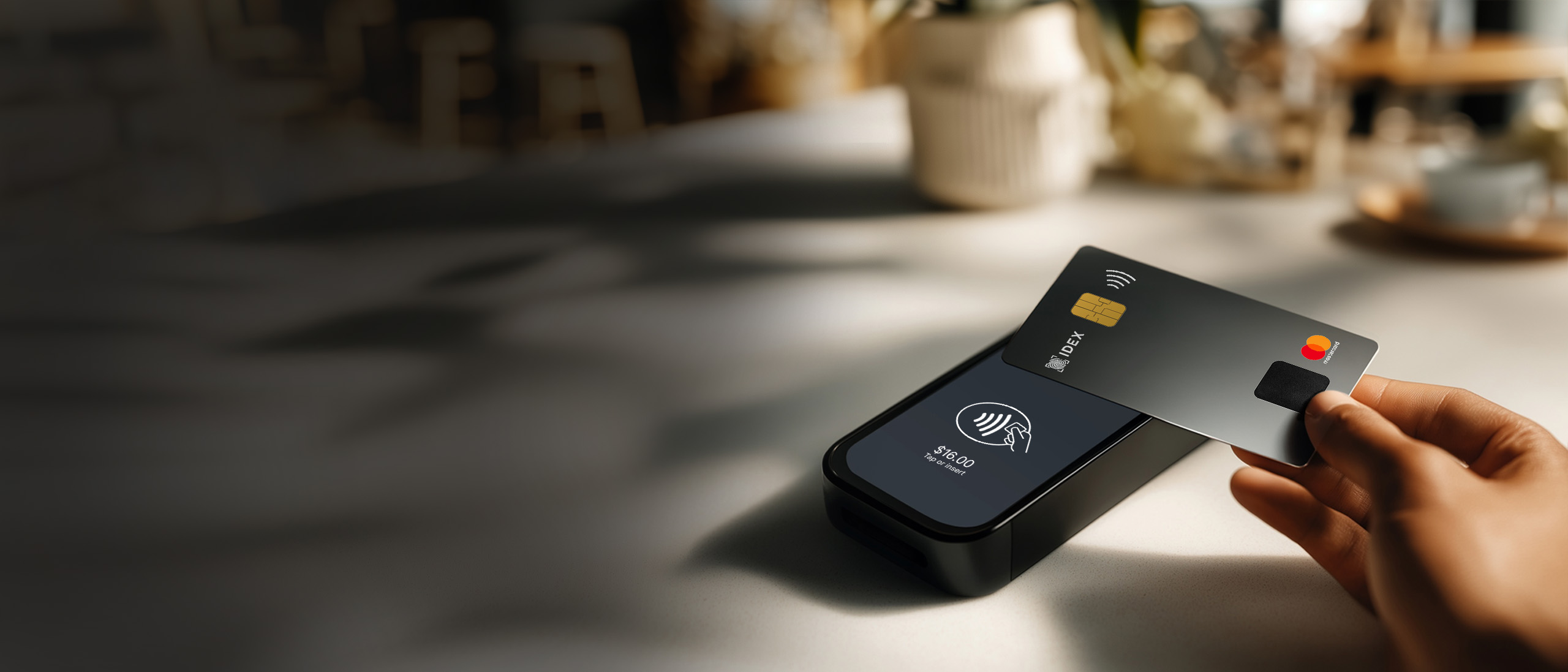 IDEX payment card with payment terminal